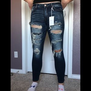 Kancan jeans tags still on